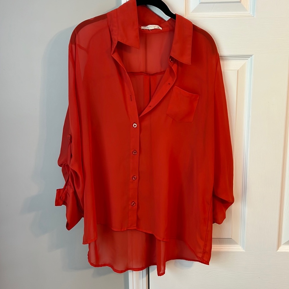 Orange mid length blouse